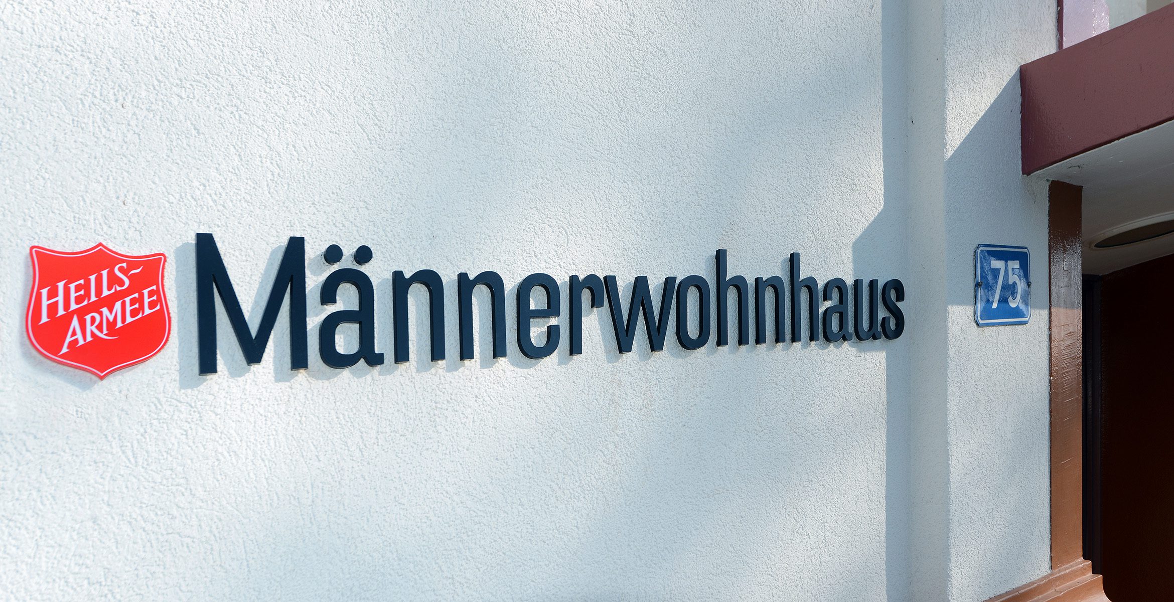 Schild Männerwohnhaus